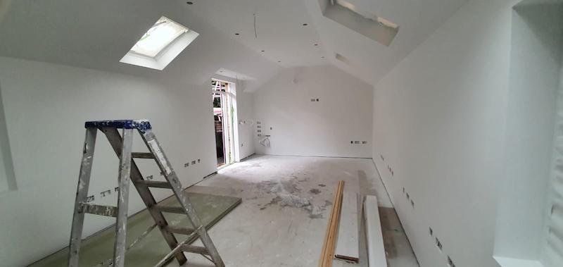 Facing the rear of The Coach House, all the plaster has been misted