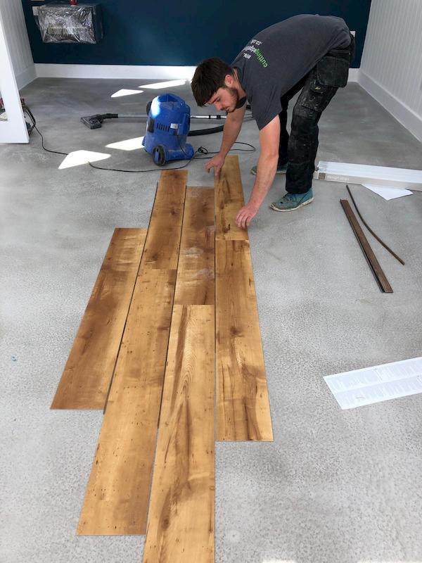 Just starting to lay the wooden fllor, first pieces down at the very centre of the room