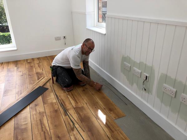 Floor laying in progress