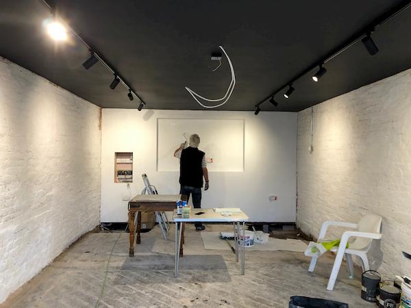 Inside the ground floor of The Coach House, new spot lights and black ceiling evident