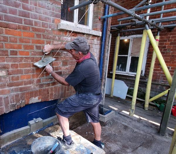 Fixing the brickwork to get rid of broken brick faces