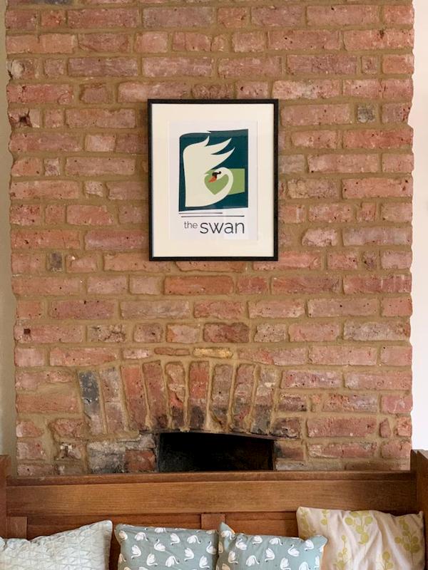 Swan pixture reinstated on one of the fireplaces