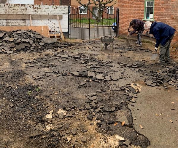 The Courtyard covered in broken up tar