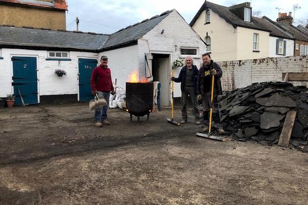 ALads standing by a fire - all done