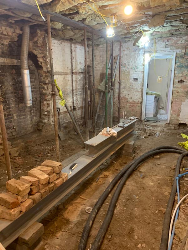 Kitchen floor stripped right back to the ground