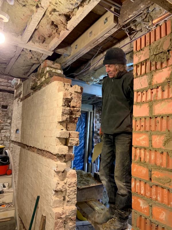 Sorting out the old wall at The Kitchen door