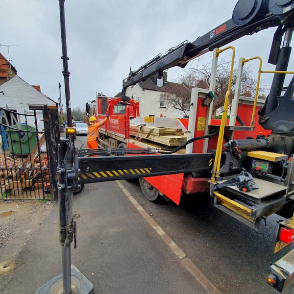 Lorry with stabilisers out