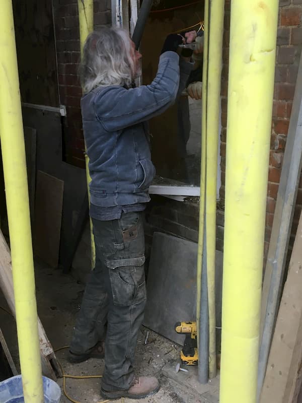 Tony removing a kitchen window