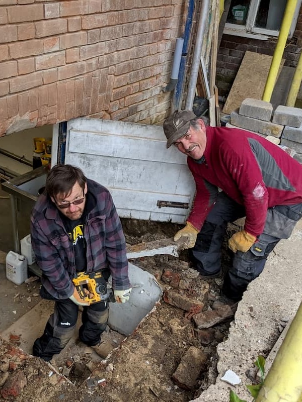 Ian and John digging out the cellar drop