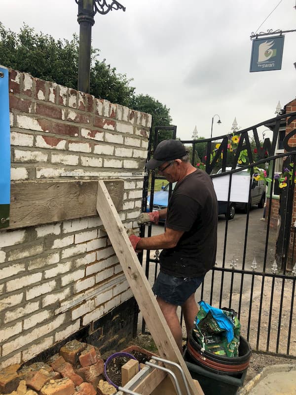 John re-pointing the front wall