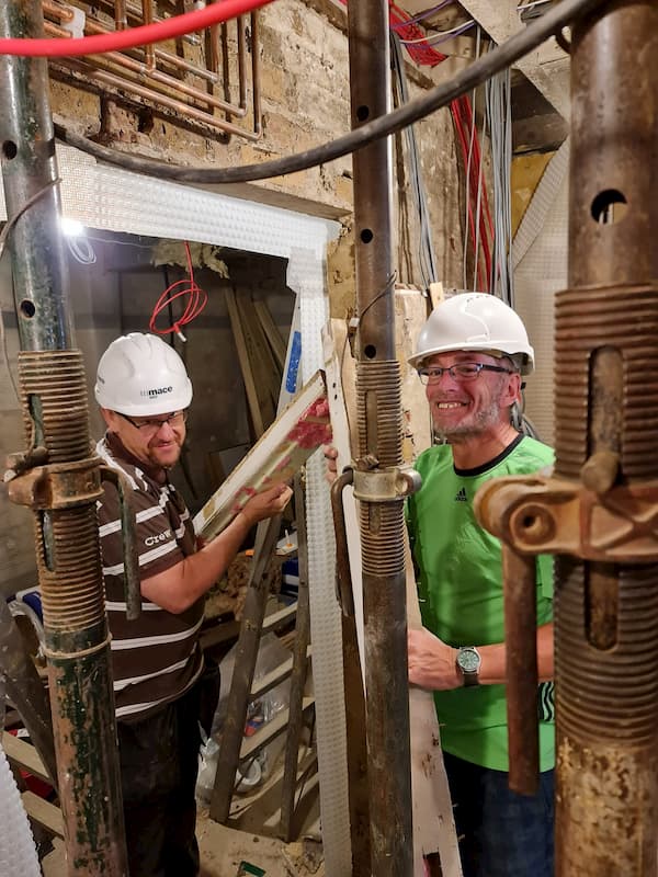 Ian and Trevor working on the door lintel