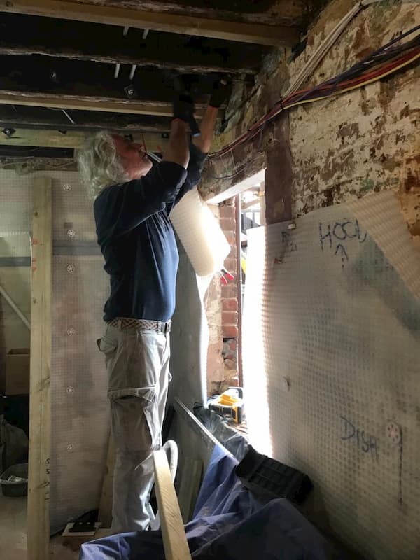 Tony working on one of the rafters