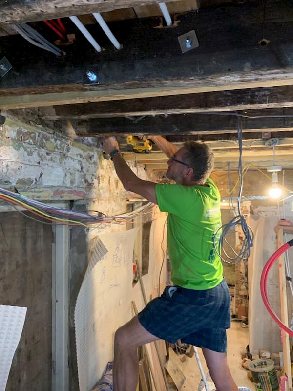 Trevor working on the rafters