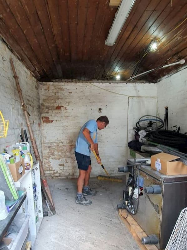 Trevor clearing out one of the stables