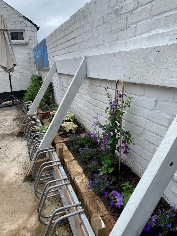 Flower beds are finished at the front wall