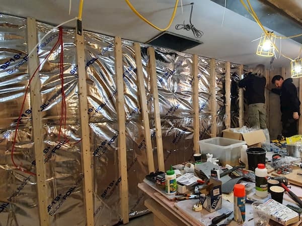 The Kitchen wall fully insulated, the Warriors now working on the battens