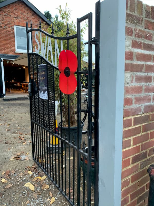 Repaired gate post and repointed wall