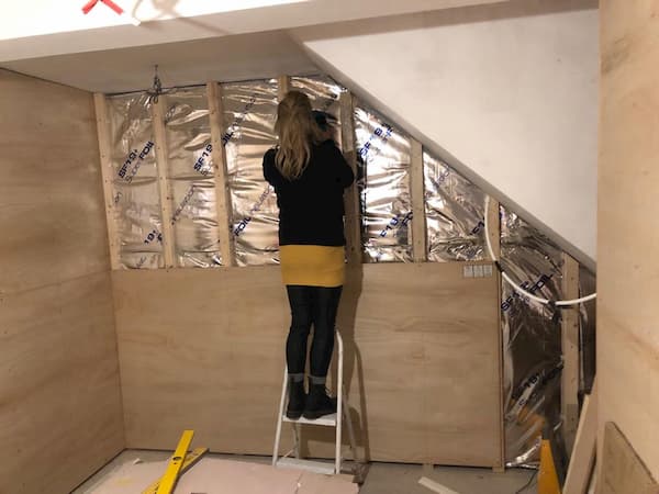 Lexie measuring angles in The Storeroom