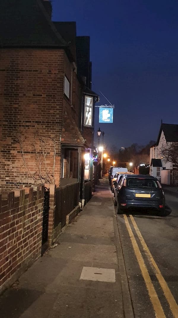 Later in the evening the sign is clearly lit up