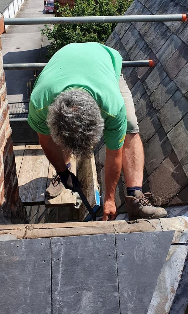 Repairing the roof tiles