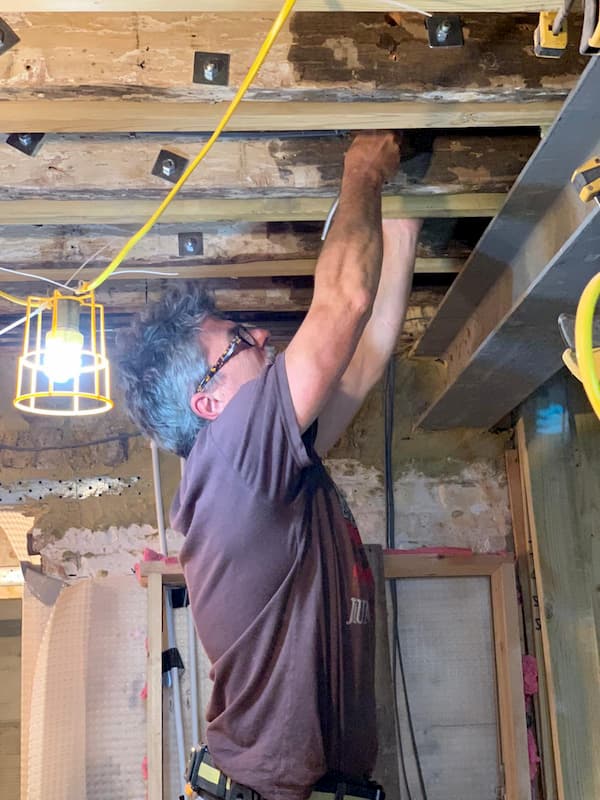 Thomas working on the rafters