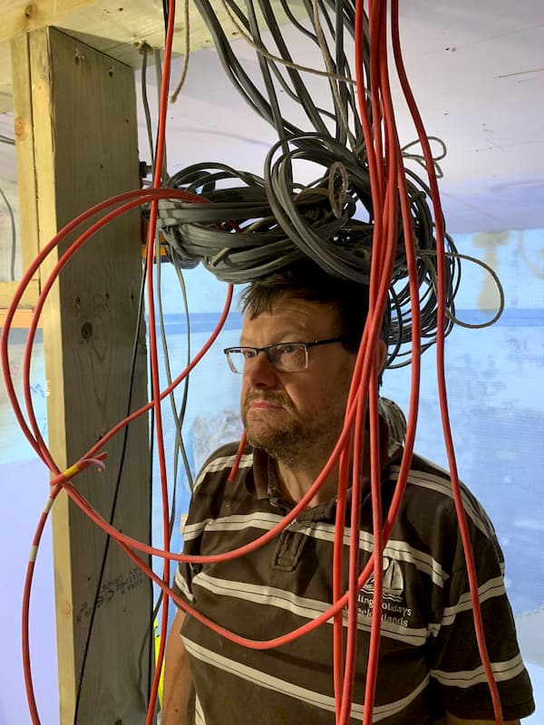Ian clowning about with 1st fix wires on his head