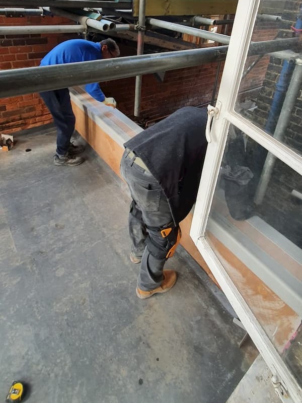Dont jump lads, fixing the getns toilet roof