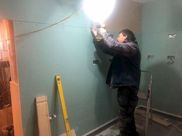 Ian fitting board in The Kitchen