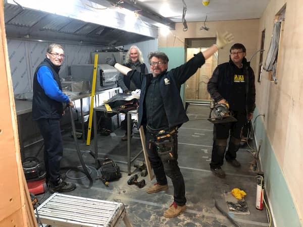 A happy Warrior team in The Kitchen