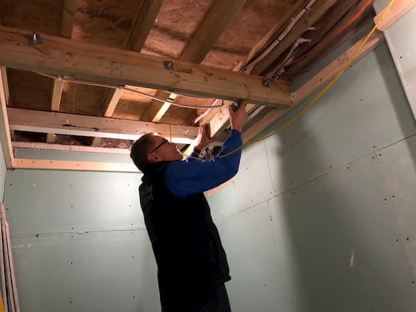 Trevor fixing one of the beams in The Coldroom