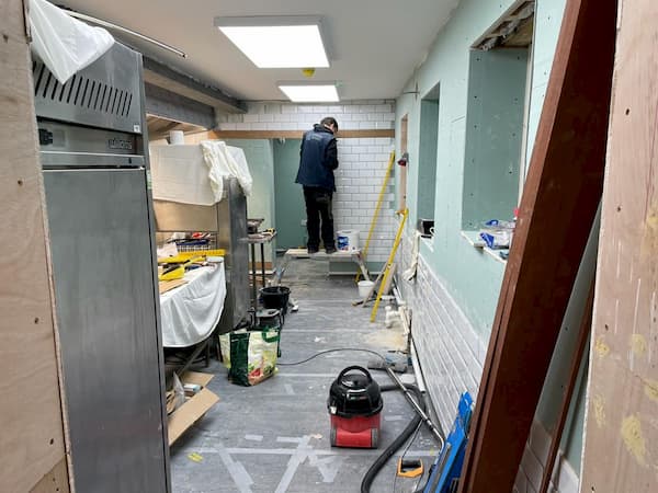 Ian tiling in The Kitchen