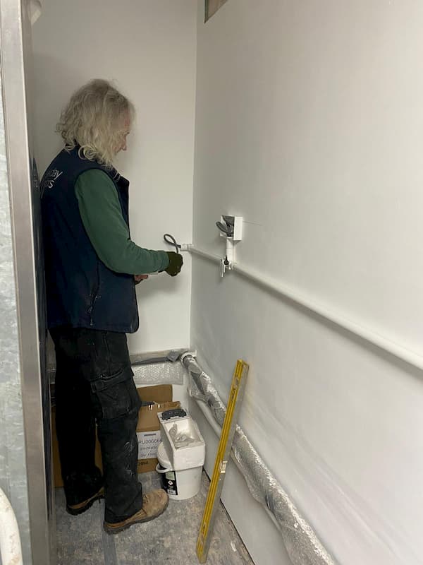 Tony fixing electrics in The Cold Room