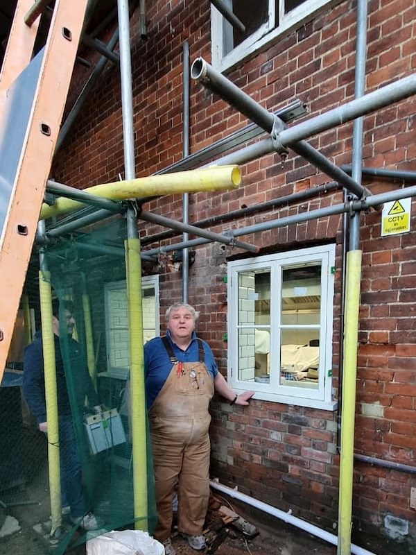 Fitting the third and final window for The Kitchen