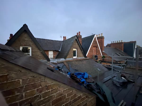 Top of the roof with lots of equipment on it.