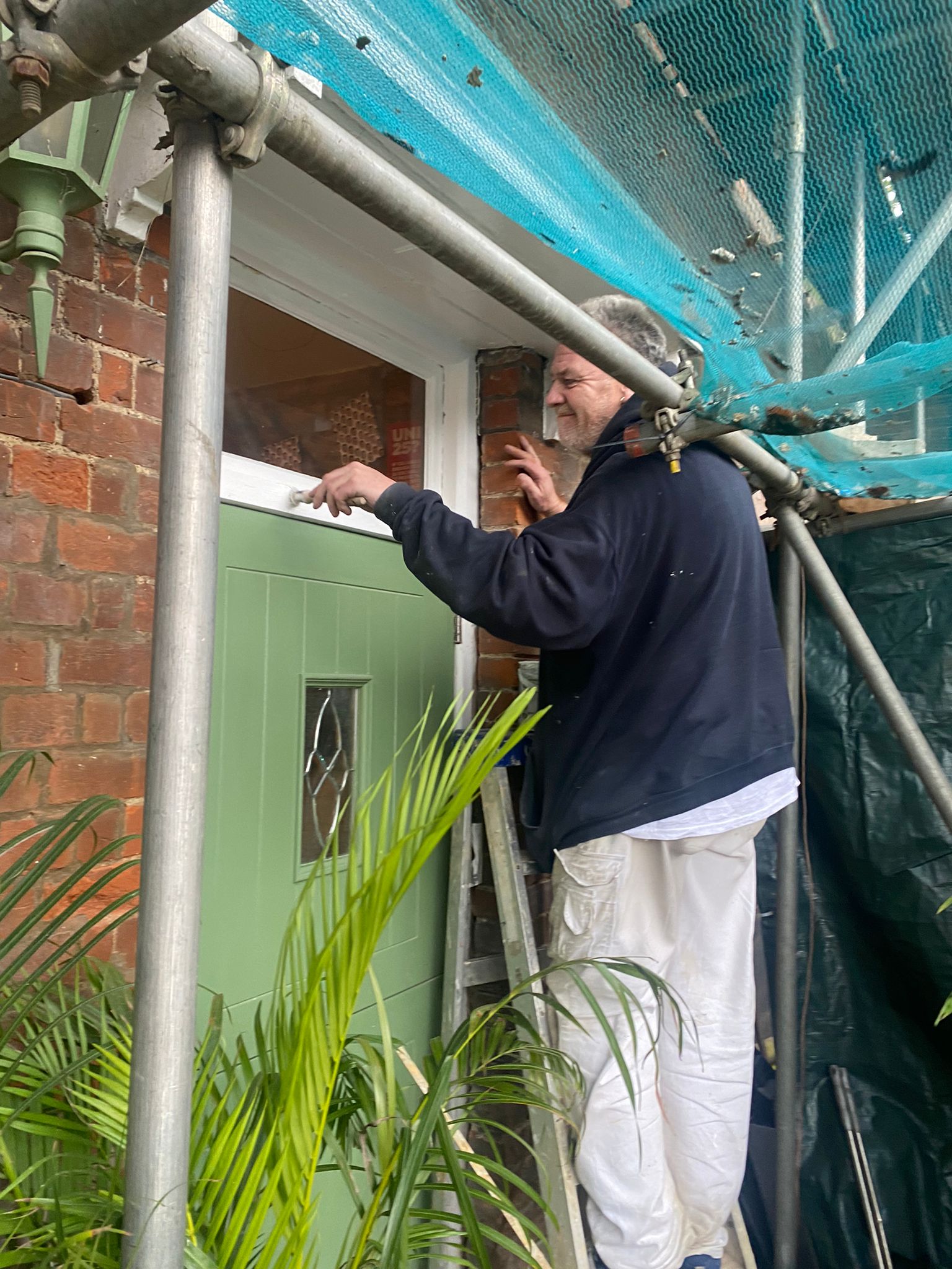 Painting above the door.