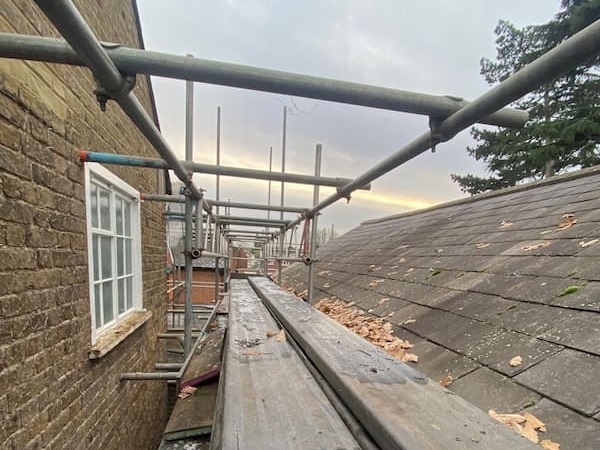 Scaffolding ready to come down, The School House is on the right hand side.