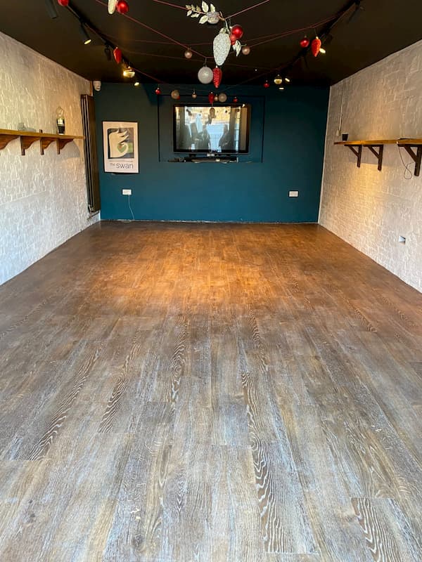 Looking into The Coach House with its new level wooden floor.