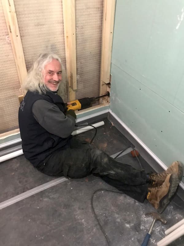 Tony drilling from The Kitchen through to The Cold Store