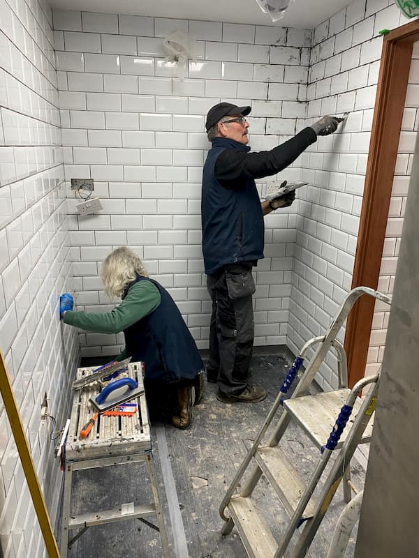 John grouting in The Cold Room