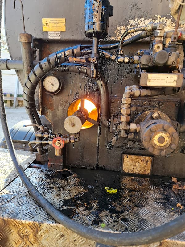 Burner heating up the tar for the new surface