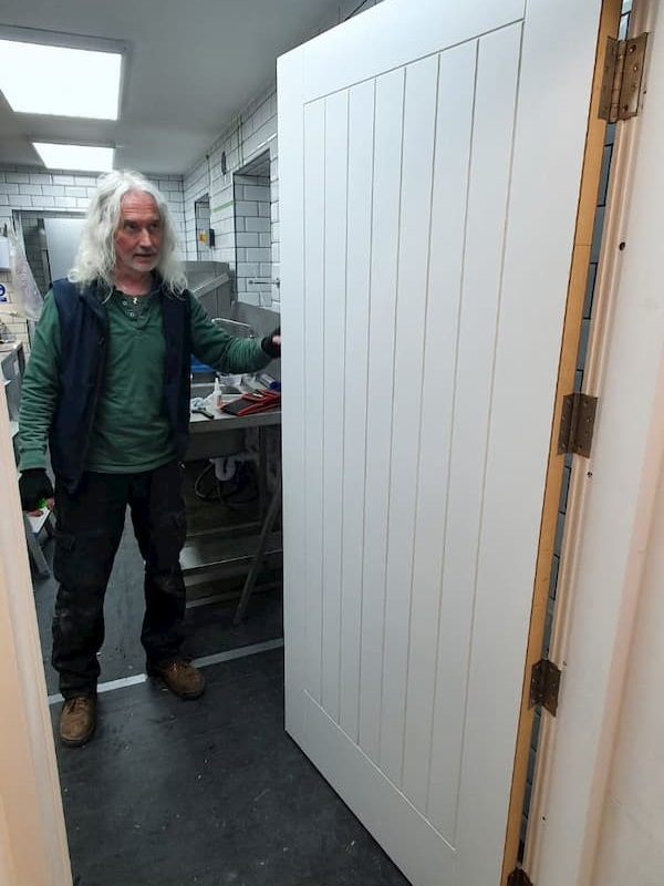A releived Tony with a working Kitchen door