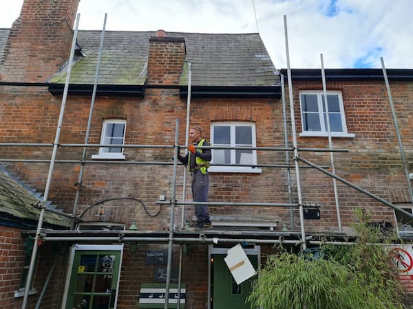 Top layer now off and Warren is working on the second level.