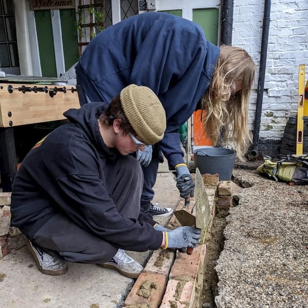 Two of the students working on the third course.