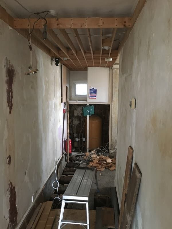 Work progresses in the first floor corridor