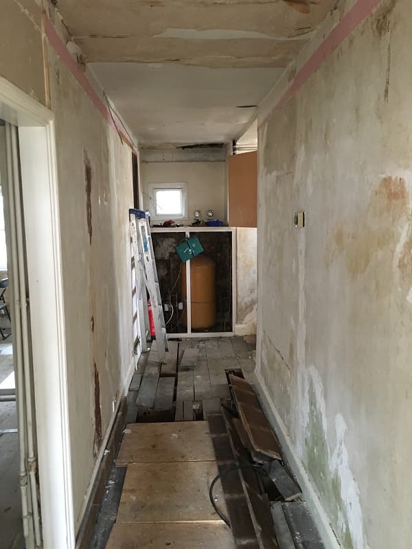Lowered ceiling removed from first floor corridor