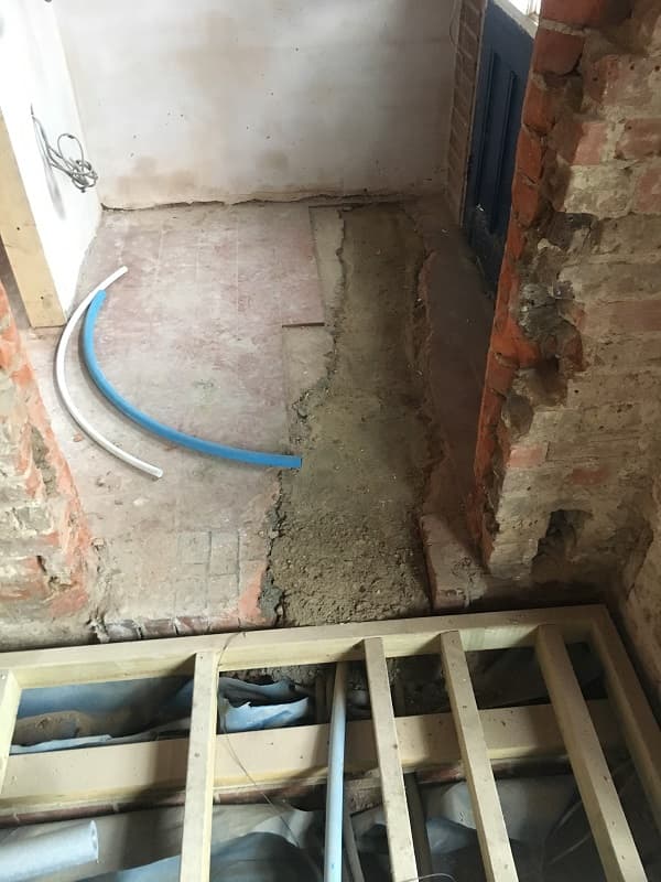 Services trench in ladies loo filled in