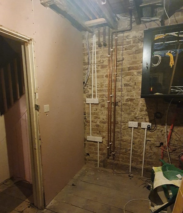 Shows the new electrical and plumbing work