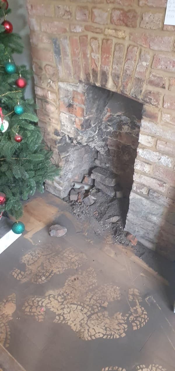 Bricks, mortar and dust came down the chimney into the pub