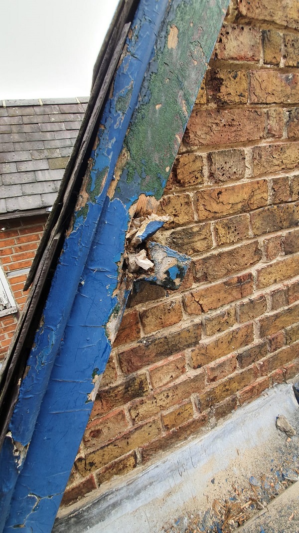 The gable end in need of repair