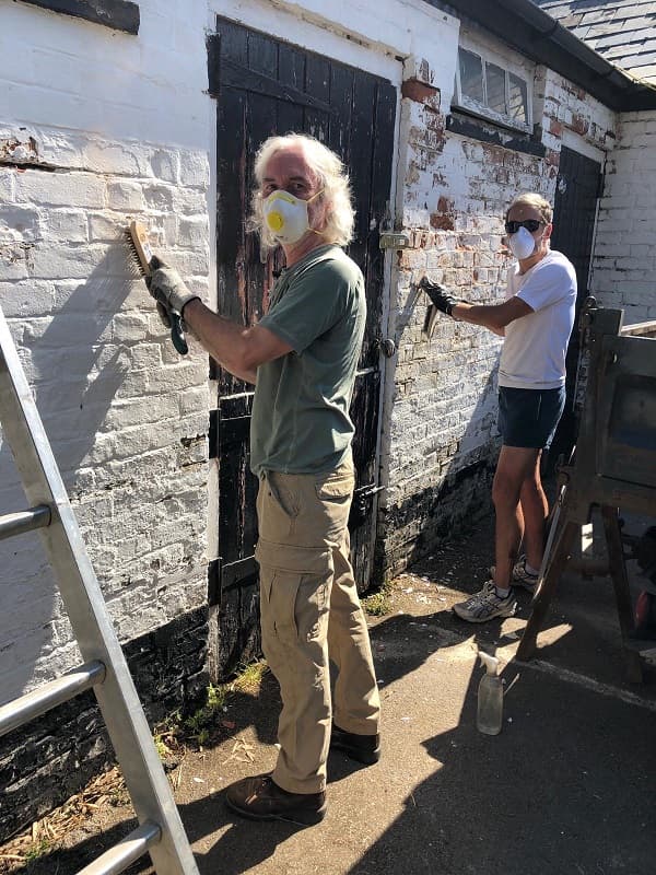 The lads scraping The Stable walls